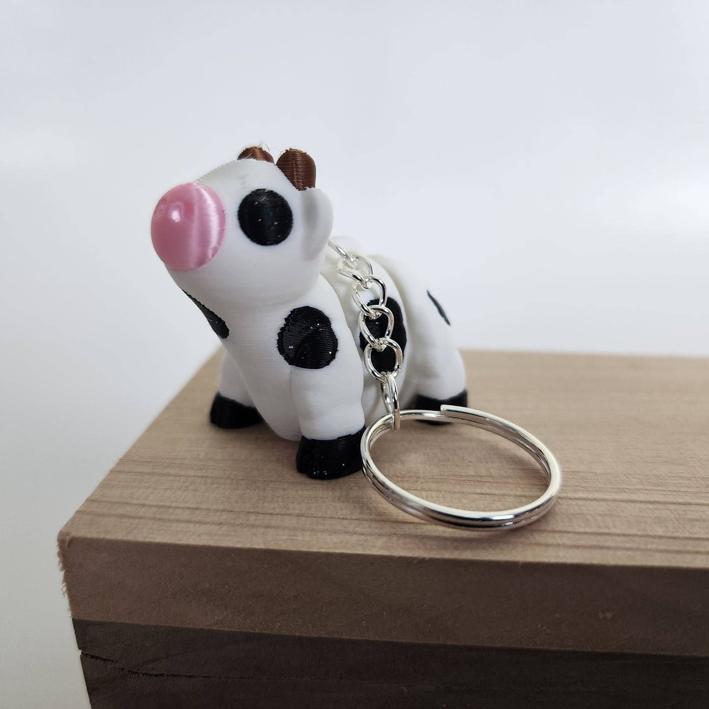 Articulated Cow Keychain Bag Charm - White/Black