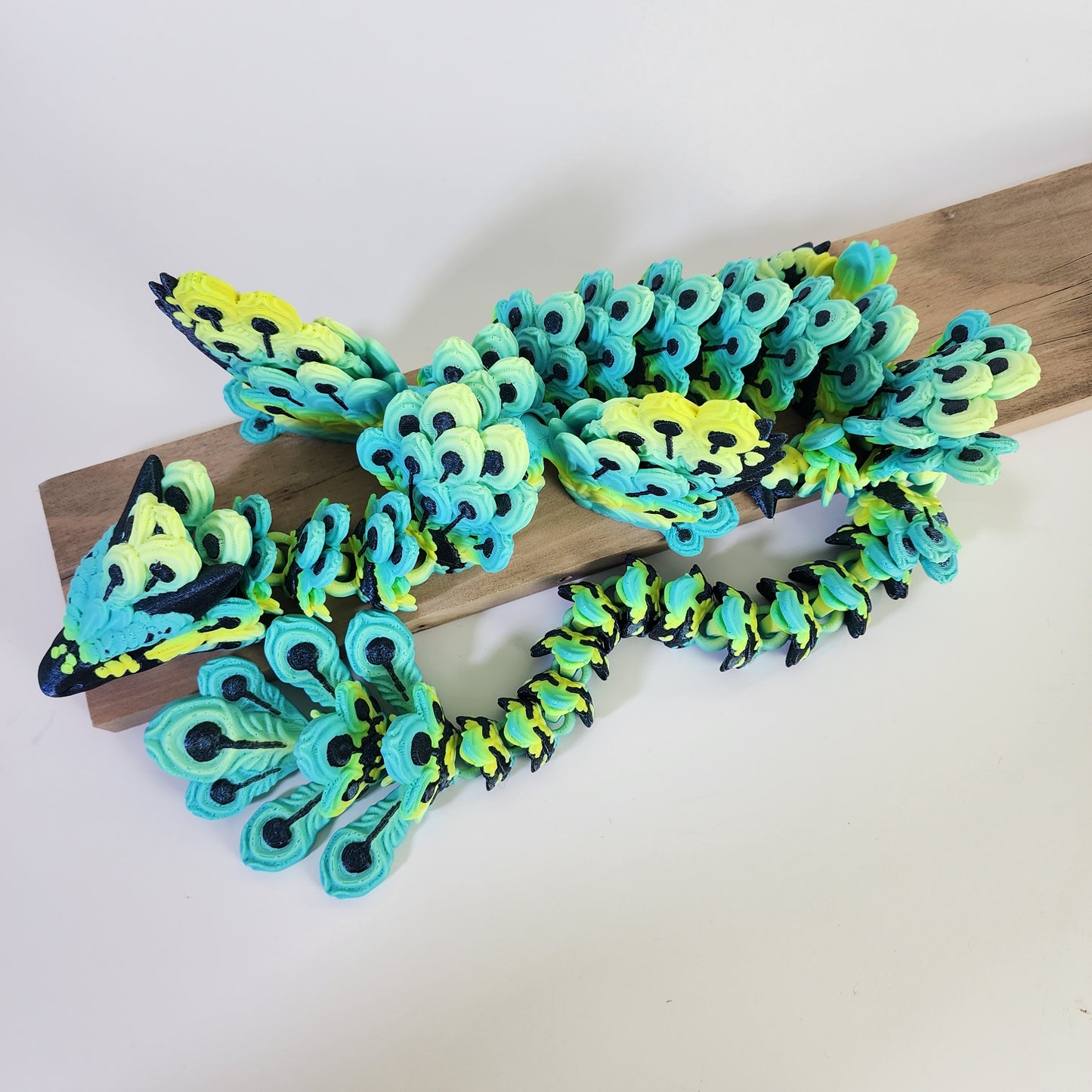 Articulated 22 Inch Winged Peacock Dragon - Burnt Titanium / Meadow Mirage
